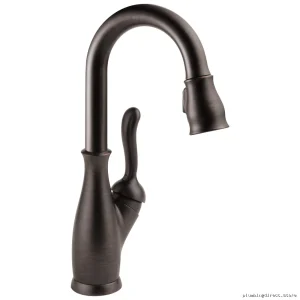 Delta Leland Venetian Bronze Bar Faucet with Easy-Pull Spray 9678-RB-DST